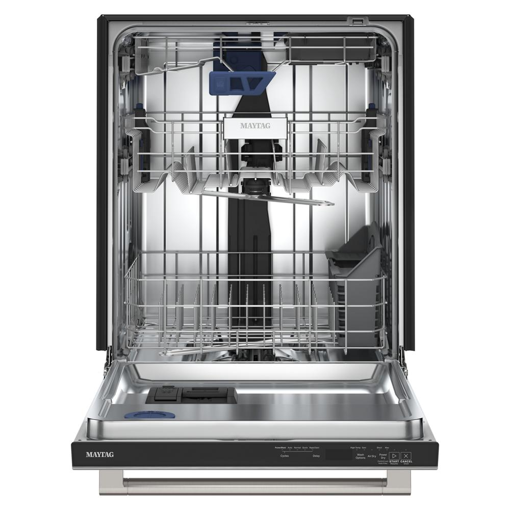 Open stainless steel interior of spacious 24-inch top control dishwasher with multiple racks in kitchen appliance setting