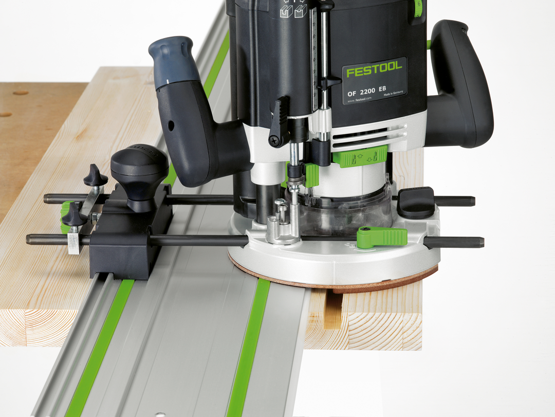 Festool 576223 OF 2200 EB-F-Plus Router cutting a precise groove on light wood with guide rail for woodworking tools collection