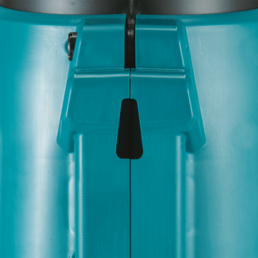 Close-up of teal brushless cordless blower housing showing battery slot and build details for home improvement tools