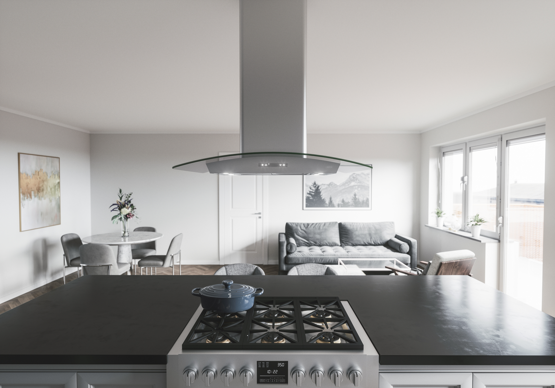 Contemporary kitchen island range hood with curved glass canopy above stovetop in bright open kitchen and living space