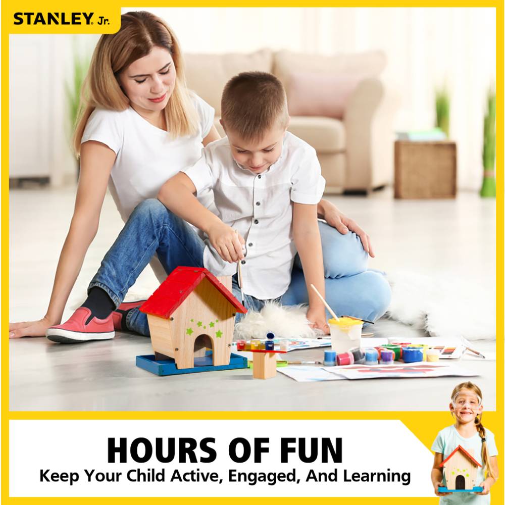 Child and adult painting and assembling Stanley Jr. DIY wooden bird feeder kit for home improvement fun