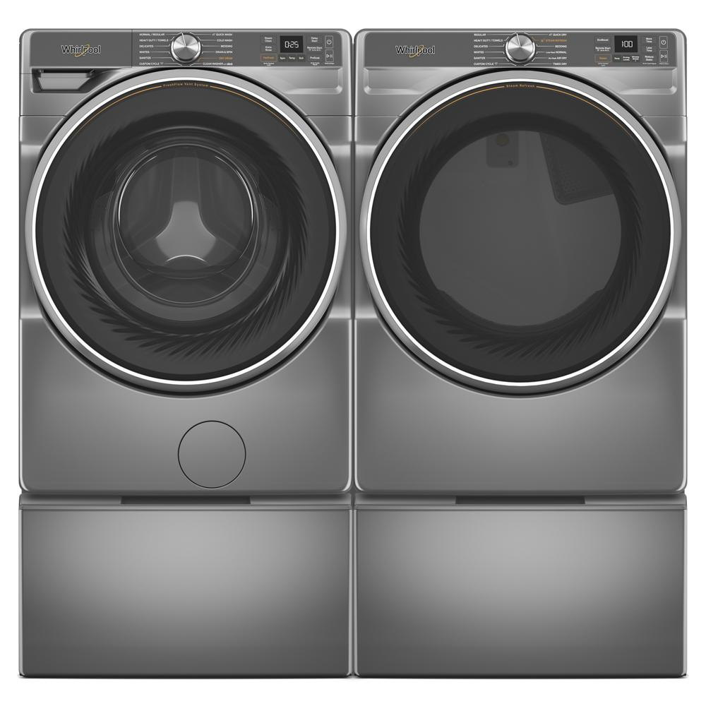 Front load washer and dryer pair in metallic finish with digital controls and matching pedestals for added storage and height