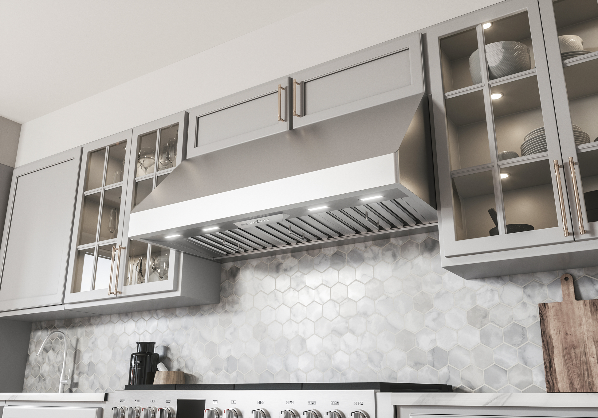 Stainless steel 36 inch canopy hood with LED lighting installed in modern kitchen from range hoods collection.