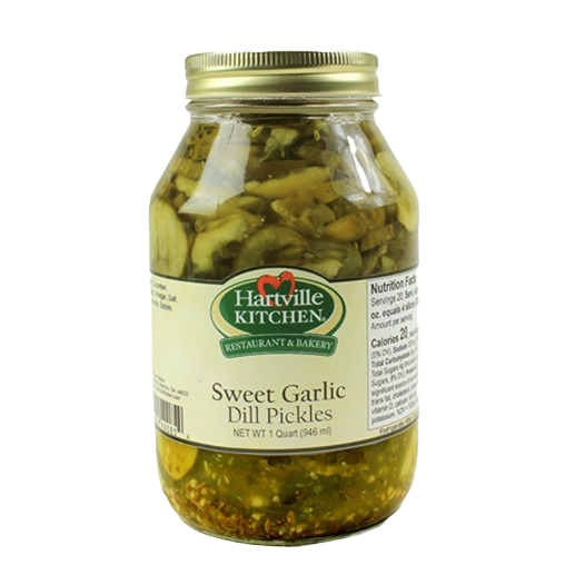 Glass jar of Hartville Kitchen sweet garlic dill pickles from food and beverage preserved goods collection