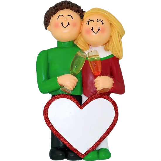 Brunette male and blonde female holding champagne glasses with glitter heart for personalized Christmas ornament decor