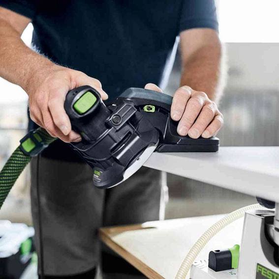 Man using Festool edge sanding guide with random orbit sander for woodworking in power tool accessories collection
