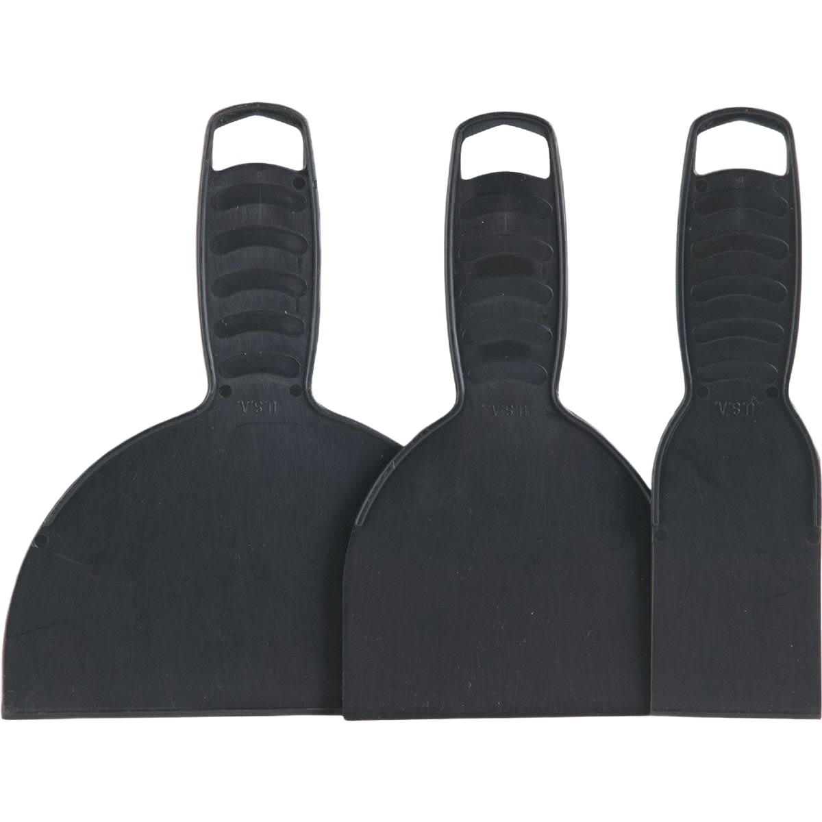 Set of three black joint and putty knives with ergonomic handles for home improvement and tools tasks