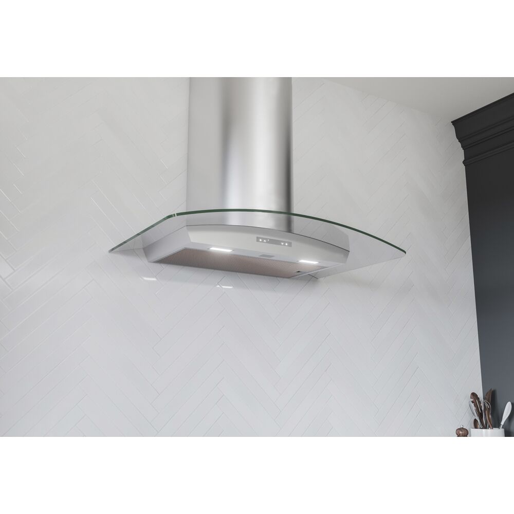 Stainless steel chimney hood with curved glass canopy, LED lighting, and touch controls in kitchenware and appliances collections