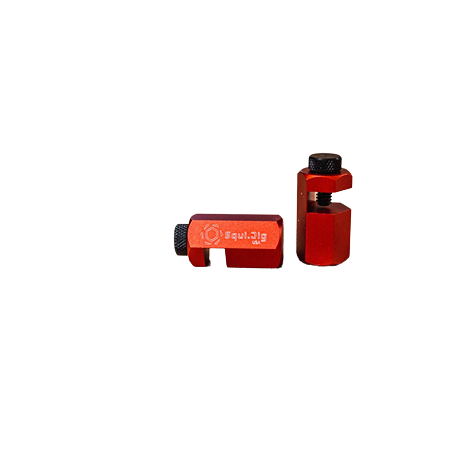 Two red aluminum framing jigs with adjustment screws for woodworking in hand and measuring tool collections