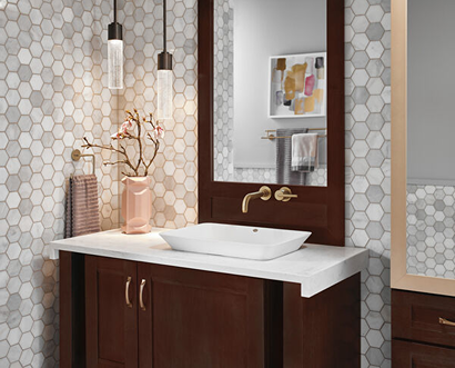 Modern bathroom featuring a champagne bronze towel ring with complementary decor in accessories and hardware collections under $100