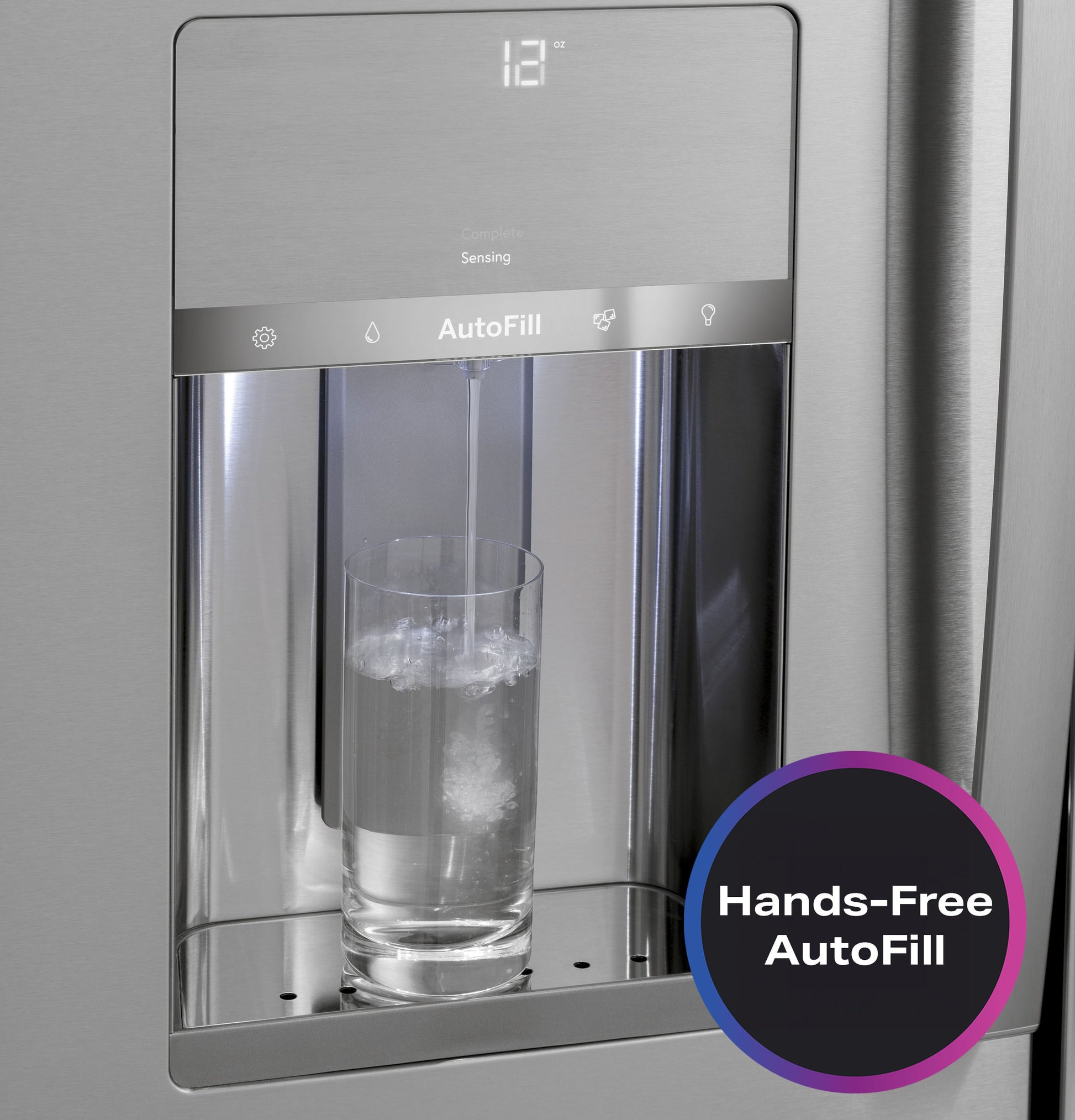 Close-up of stainless steel French-door refrigerator water dispenser with glass filling and digital temperature display