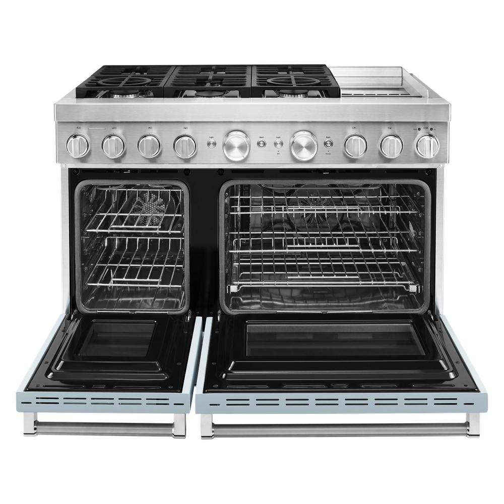 Stainless steel dual fuel range with six burners, electric griddle, and electric double oven featuring open doors in kitchenware collection
