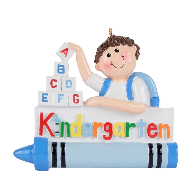 Pink crayon ornament with smiling boy stacking colorful alphabet blocks and playful kindergarten lettering from Christmas collection