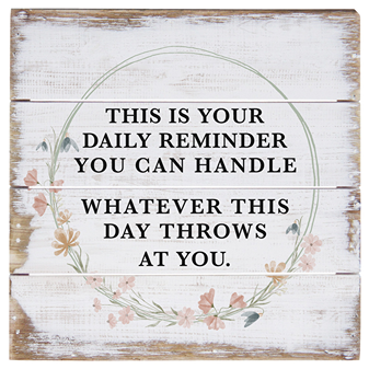 Rustic wood wall decor with motivational daily reminder text and floral wreath design in Home Accents collection