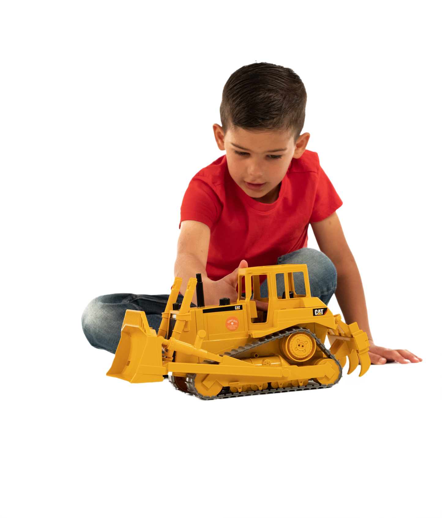Child playing with detailed Bruder Caterpillar Bulldozer toy featuring realistic tracks and movable front blade for home improvement play