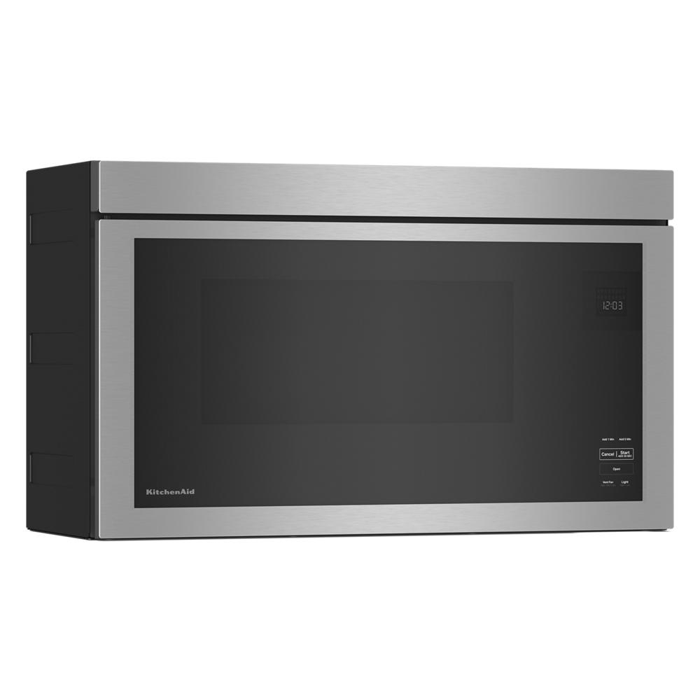 Stainless steel over-the-range microwave with flush built-in design and digital control panel in kitchen setting