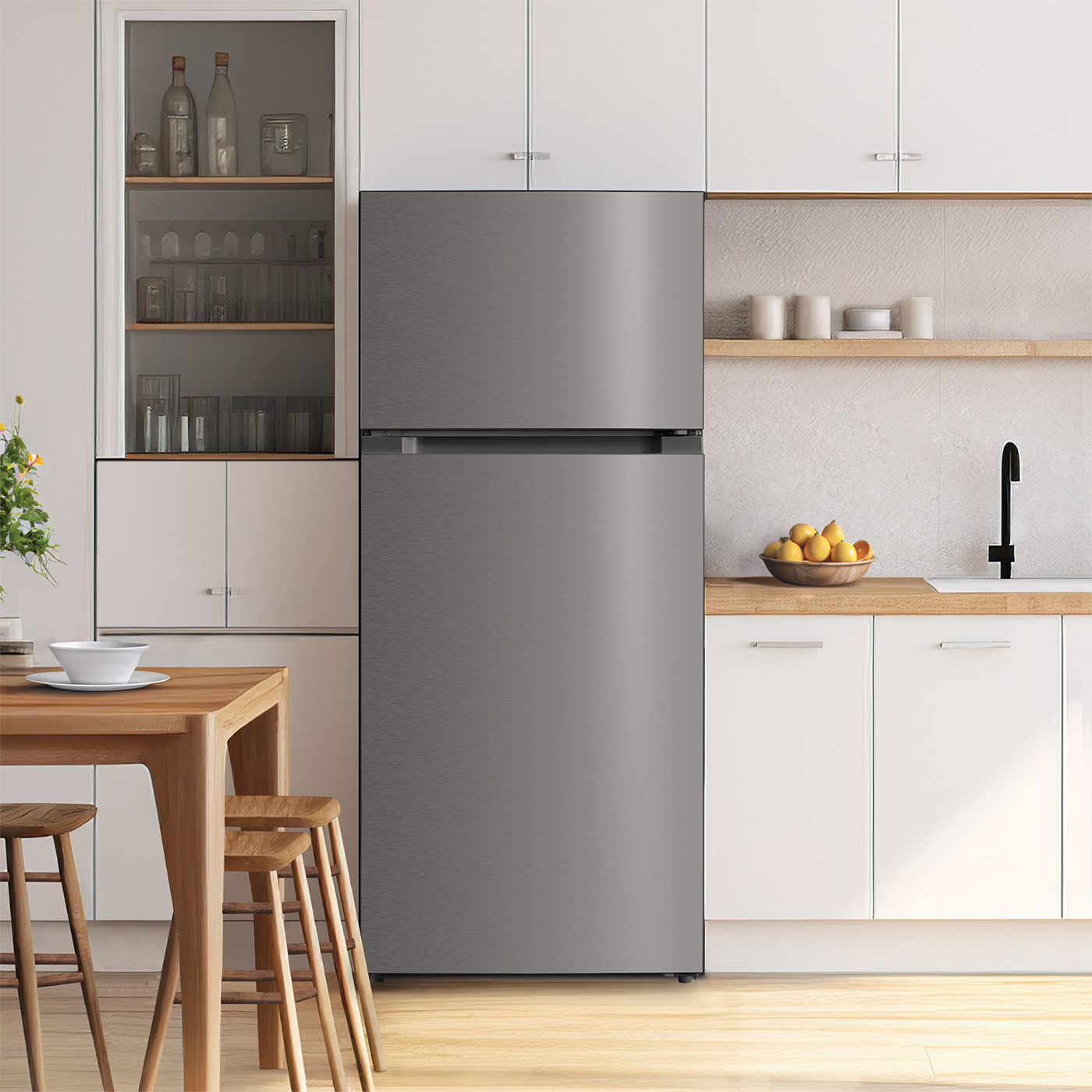 Stainless steel top freezer refrigerator in modern kitchen setting with wood dining table and white cabinetry
