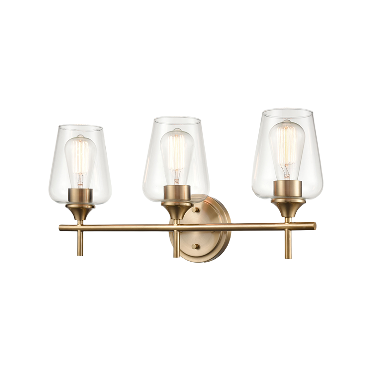 Gold three-light vanity fixture with clear glass shades for bathroom wall lighting and home improvement projects