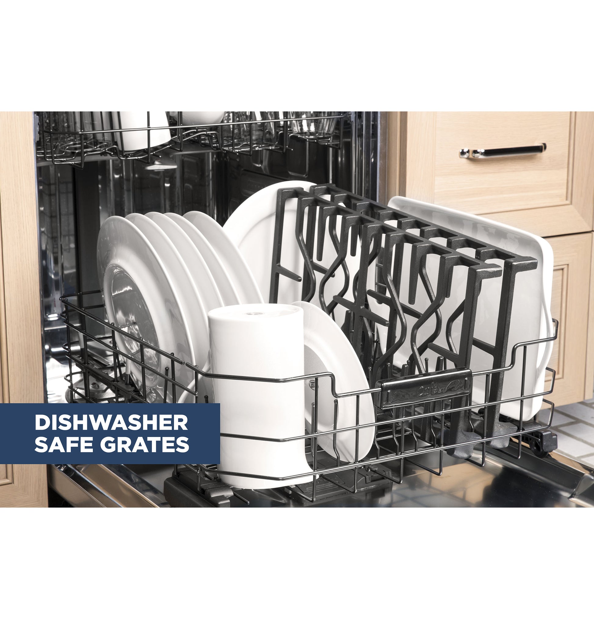 Dishwasher rack loaded with plates and grates labeled dishwasher safe inside kitchen cabinetry setting