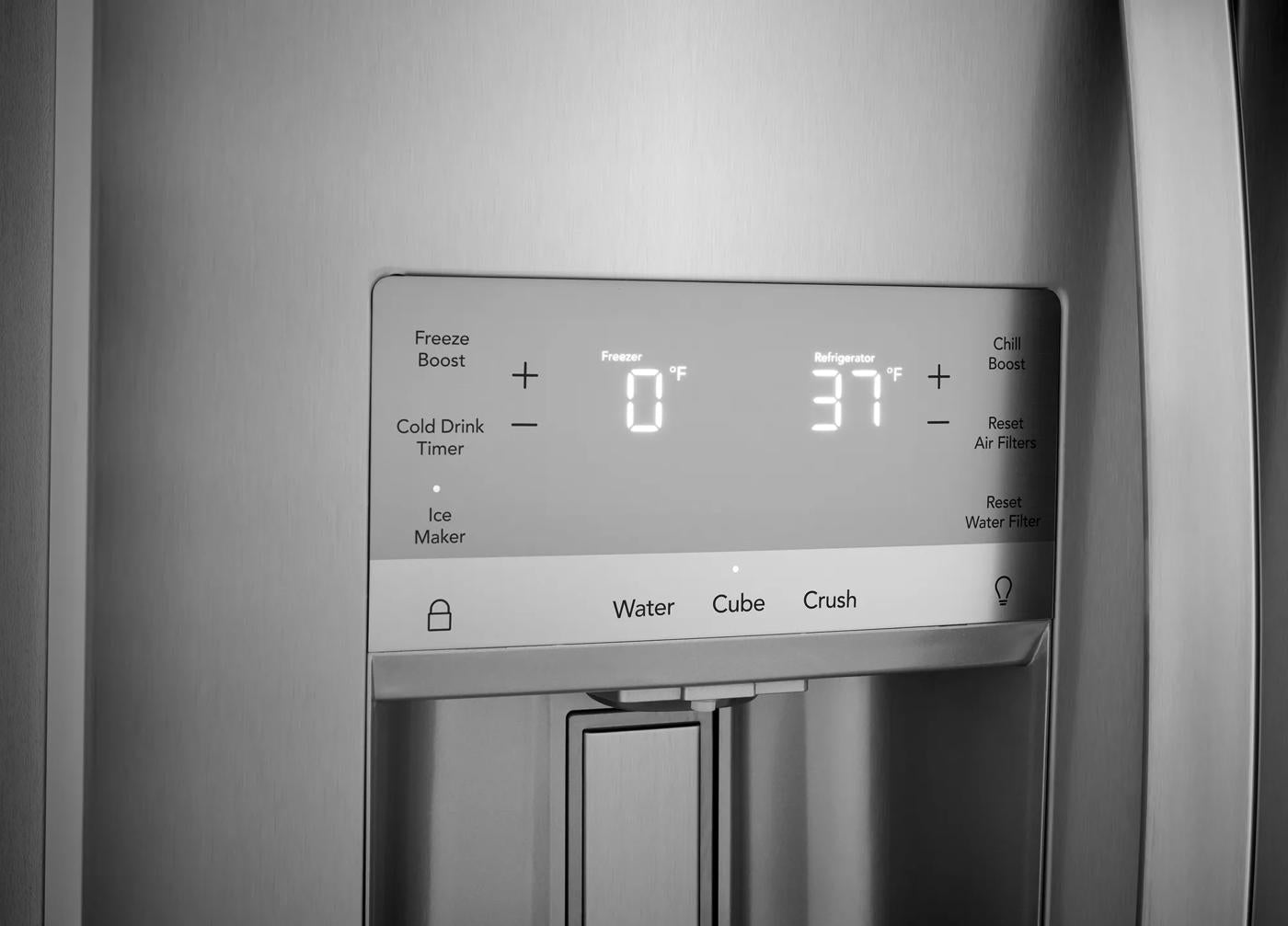 Close-up of stainless steel refrigerator's digital control panel with water, ice cube, and crushed ice options for appliances