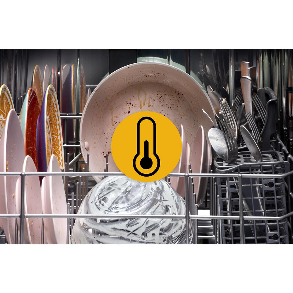 Inside stainless steel dishwasher rack with dirty plates, bowls, and assorted silverware ready for intelligent wash cycle