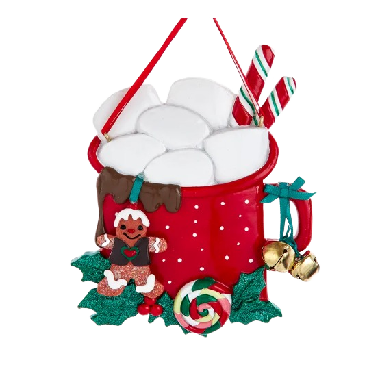 Red holiday ornament shaped like a mug with marshmallows, candy canes, gingerbread, and jingle bells decoration