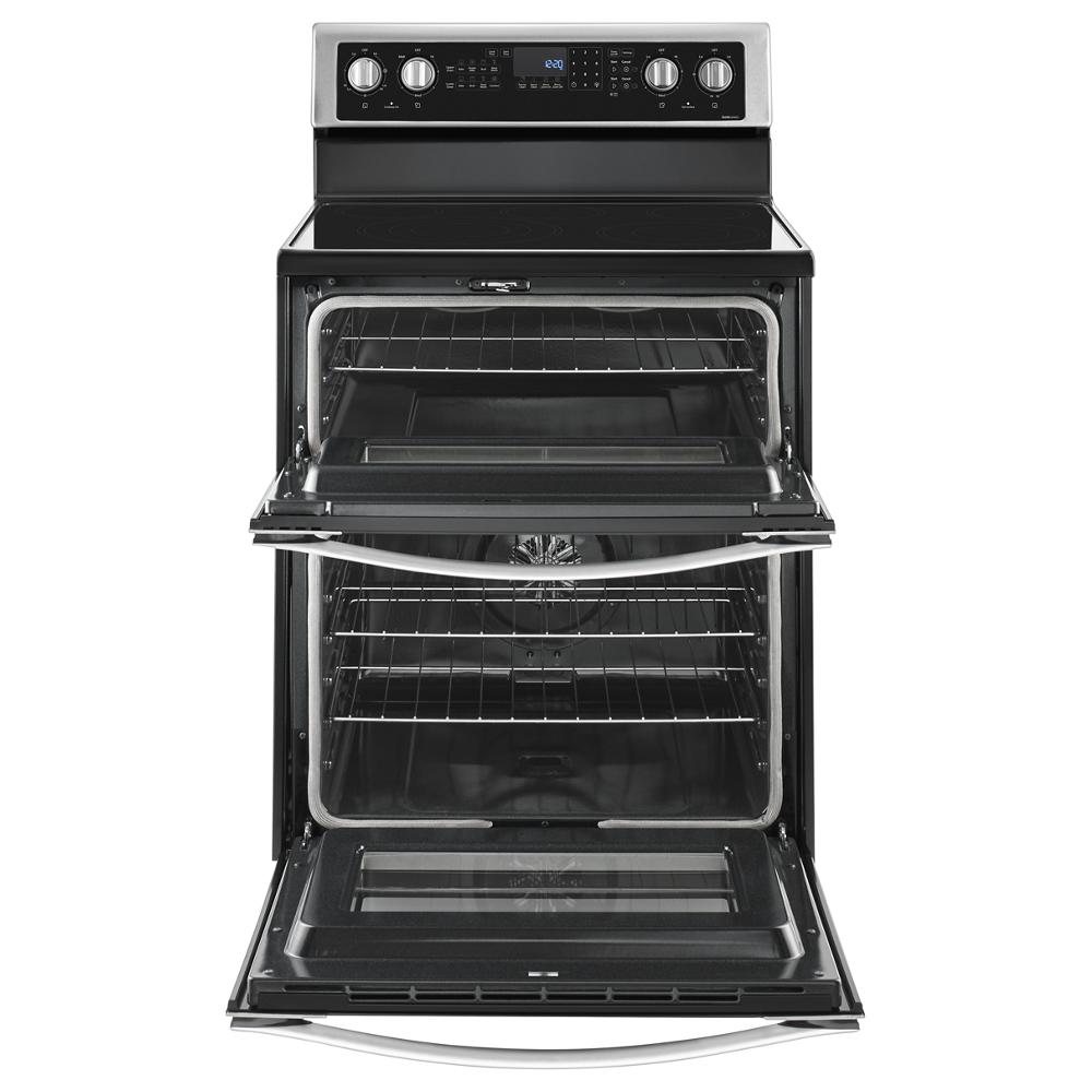 Open black electric double oven range with control knobs on top and two glass oven doors from kitchen appliances collection