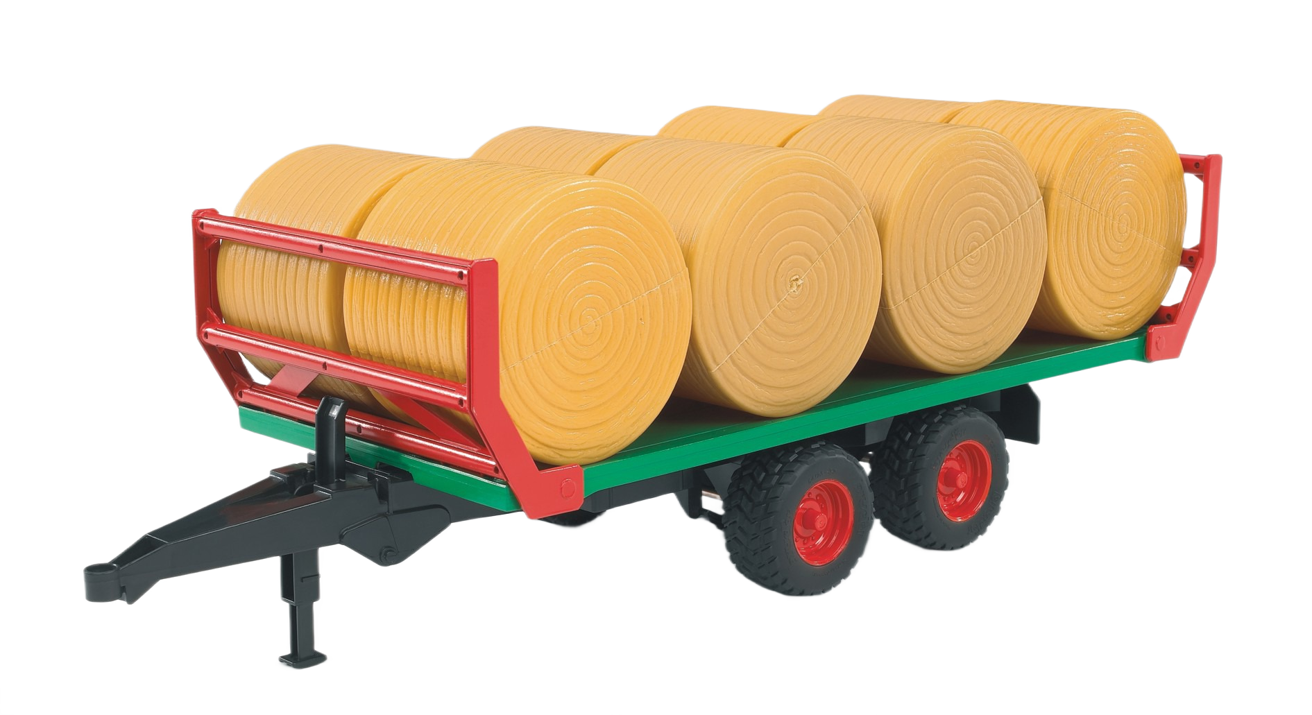 Flatbed trailer loaded with round yellow hay bales arranged in rows for agricultural transport use
