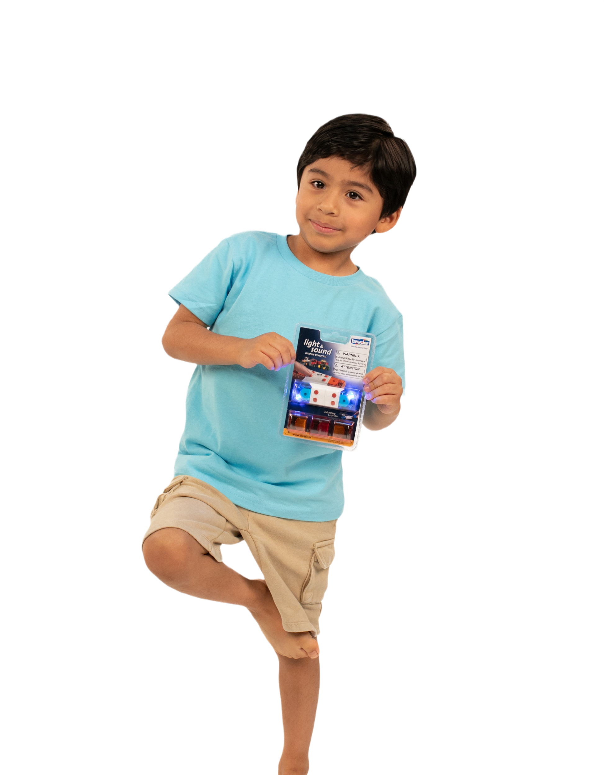 Young boy in blue shirt and tan shorts holding a light and sound module toy from Vehicles & Remote Controlled Toys collection