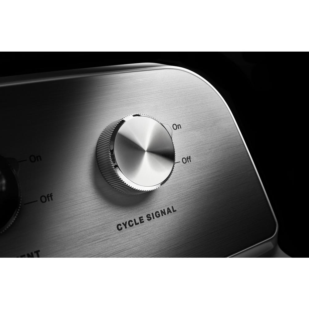 Silver cycle signal control knob set against a brushed metal panel on a gas dryer in the appliances collection