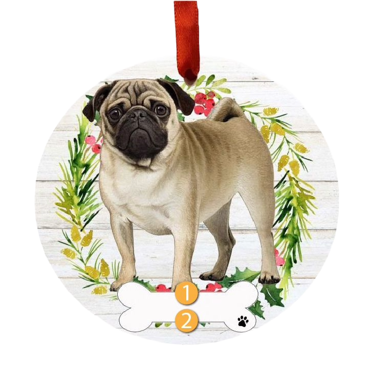 Round Christmas ornament with a beige pug standing in front of a decorative green and red wreath