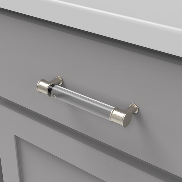 Clear acrylic cabinet pull with satin nickel mounting posts installed on gray cabinet drawer for home improvement projects