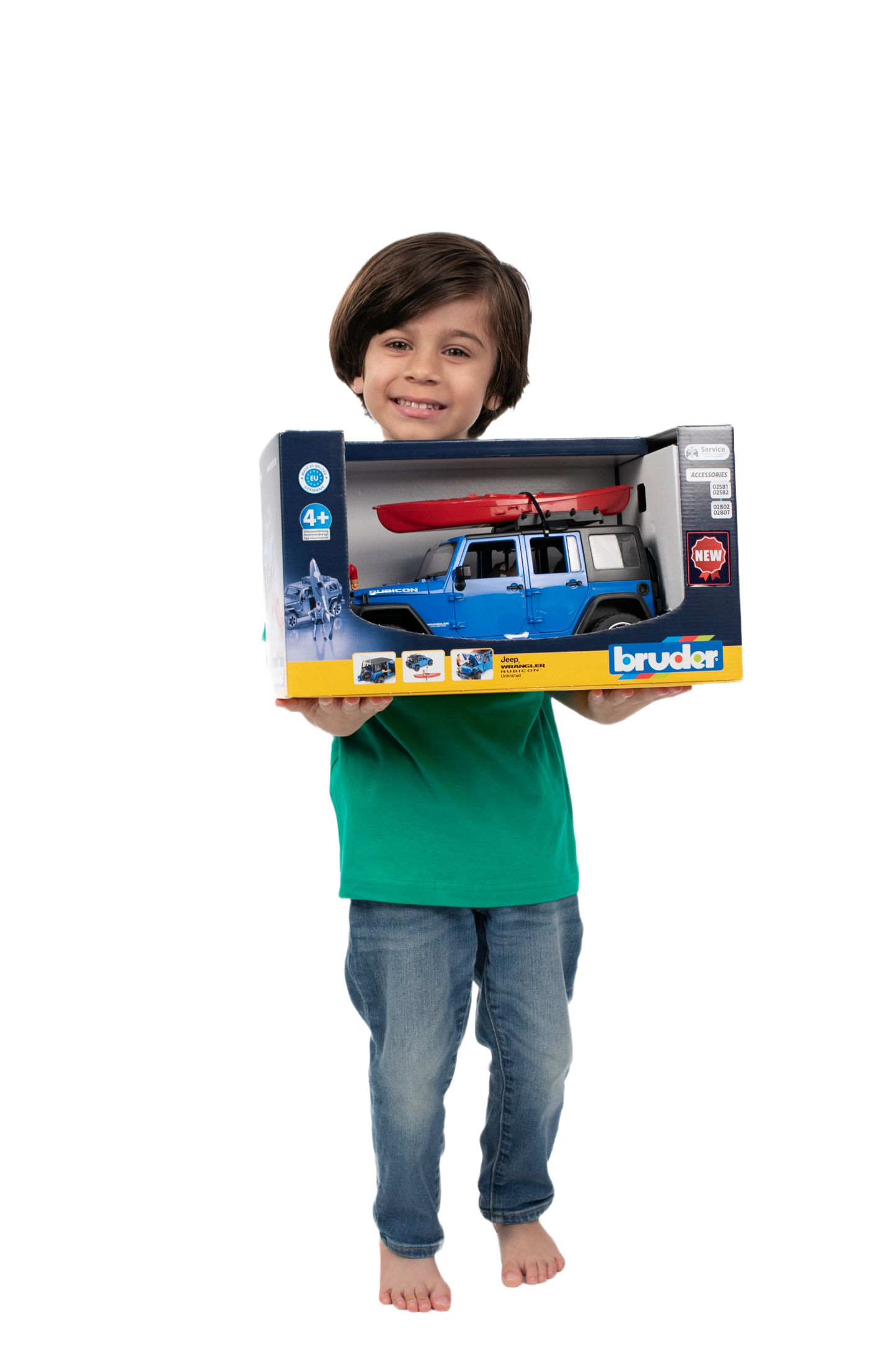 Child holding Bruder blue Jeep Wrangler Rubicon toy with red kayak in branded packaging box