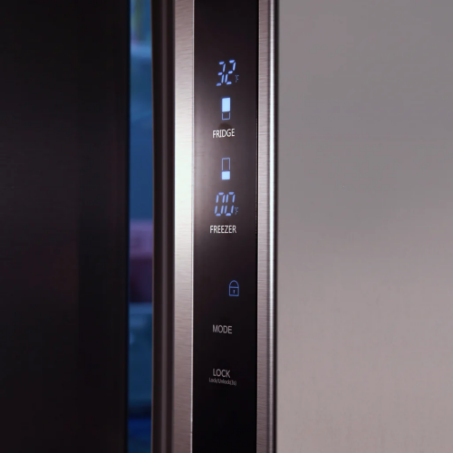 Close-up of stainless steel fridge control panel showing temperature settings and lock feature for kitchen appliances