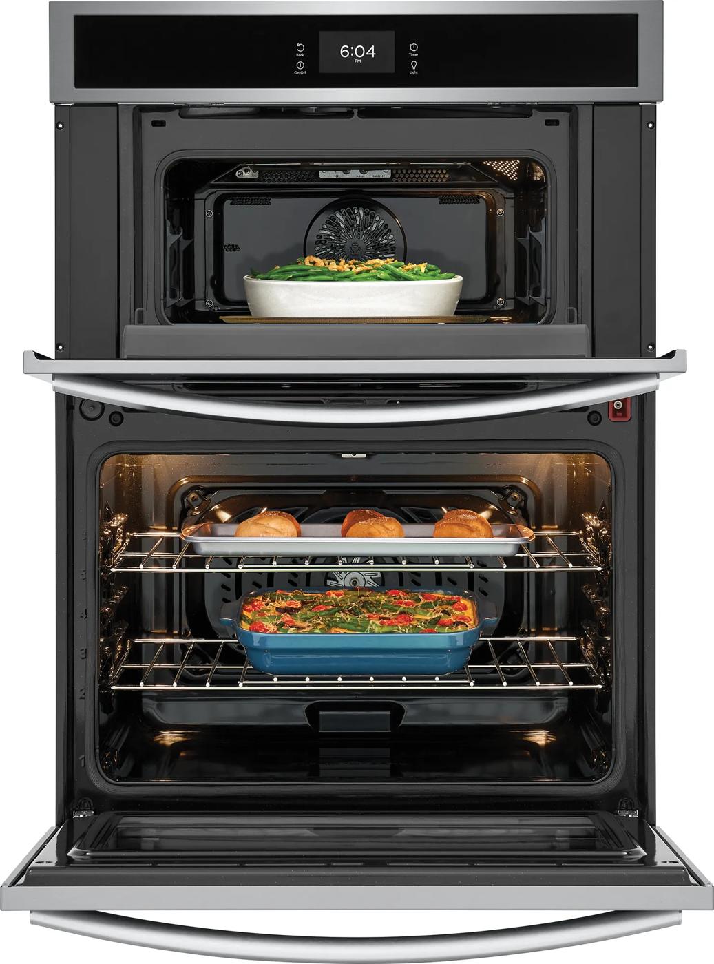 Stainless steel 30-inch electric wall oven and microwave combo with food inside in kitchen appliances collection