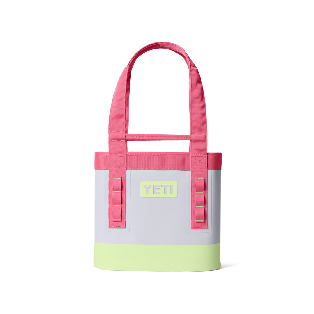 Compact carryall bag with pink handles and pale green base for everyday use in accessories and bags collection