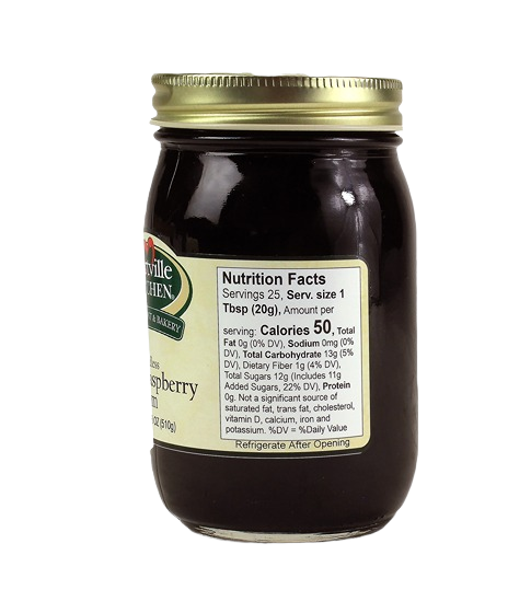 Glass jar of seedless black raspberry jam with nutrition facts label from Hartville Kitchen jams and jellies collection