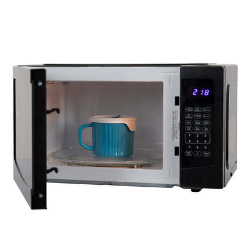 Compact microwave oven with digital keypad and blue cup inside, ideal for kitchen and home appliances collection