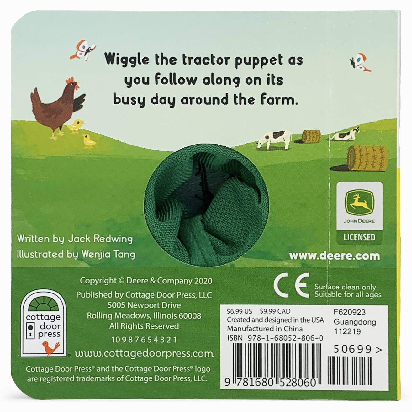 Back of children’s book with fabric tractor puppet and illustrated farm animals in a green landscape scene