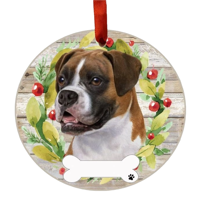 Round Christmas decoration featuring a Boxer dog portrait framed by a festive holly wreath with red berries and hanging ribbon