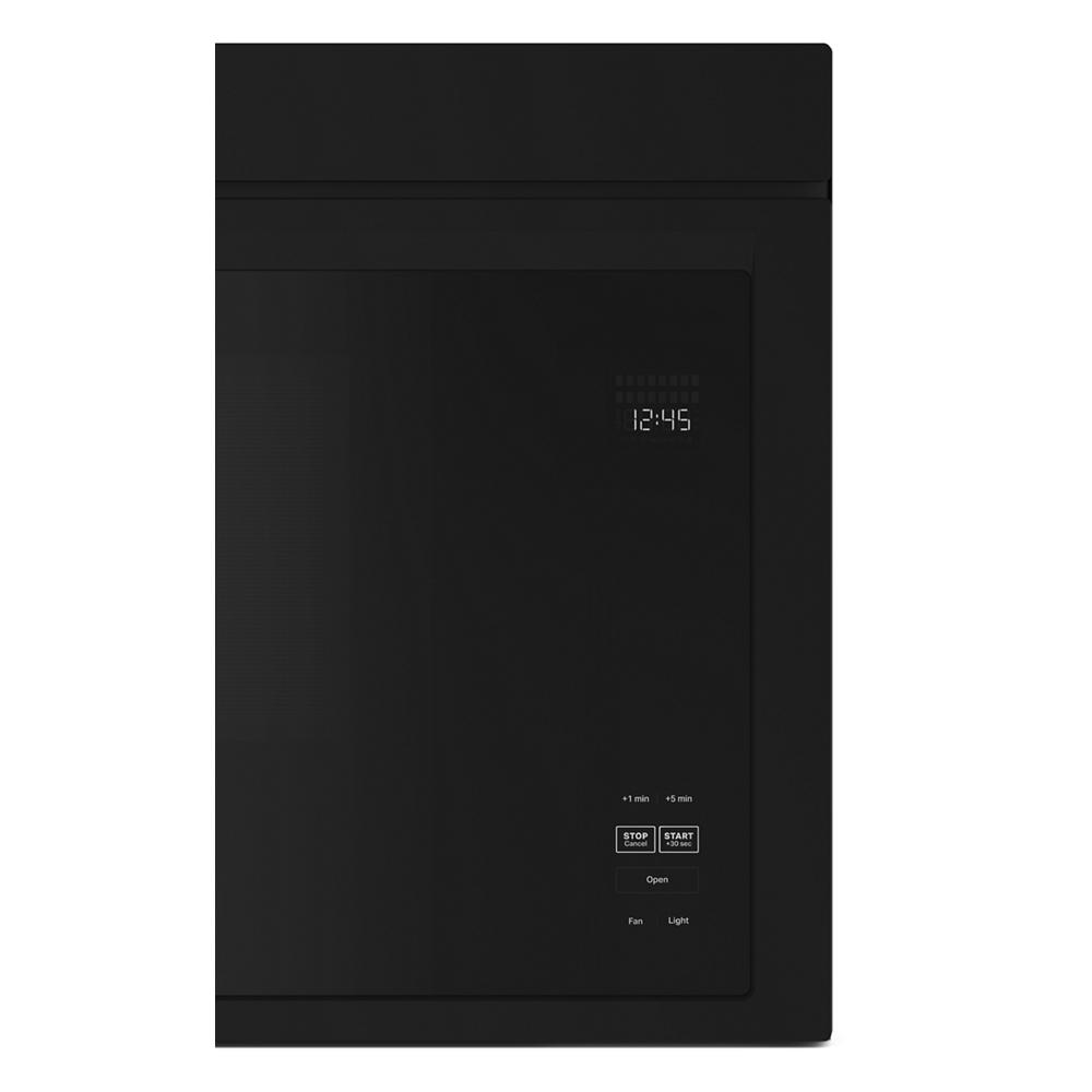 Black over-the-range built-in microwave with digital display and touch control panel in kitchen appliances collection