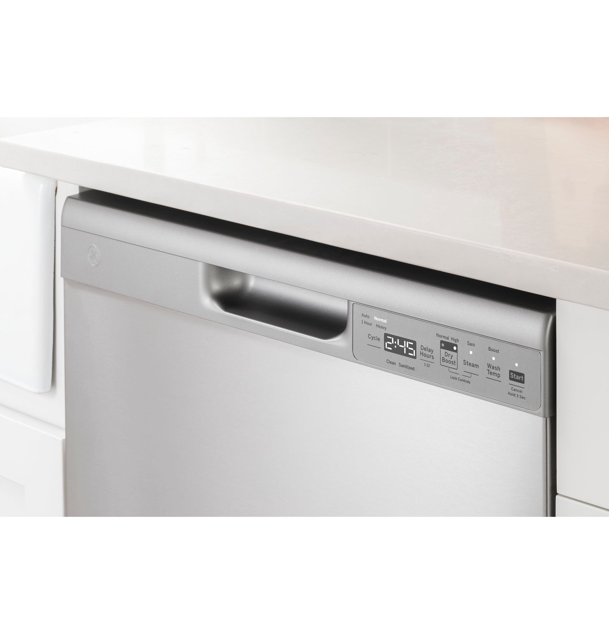 Close-up of stainless steel front control dishwasher with digital display integrated into white kitchen cabinetry