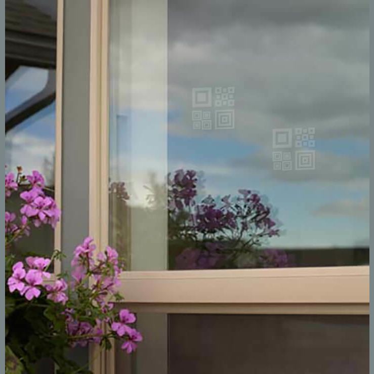 Transparent square UV decals on window glass with reflected sky and purple flowers in home and wildlife supplies collection