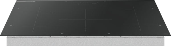 Black induction cooktop with smooth surface and four cooking zones from Bosch 800 Series in kitchenware collections