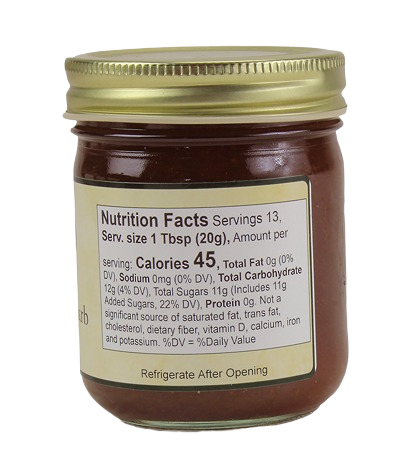 Back view of Hartville Kitchen 9 oz. strawberry rhubarb jam jar showing nutrition facts label in jams & jellies collection