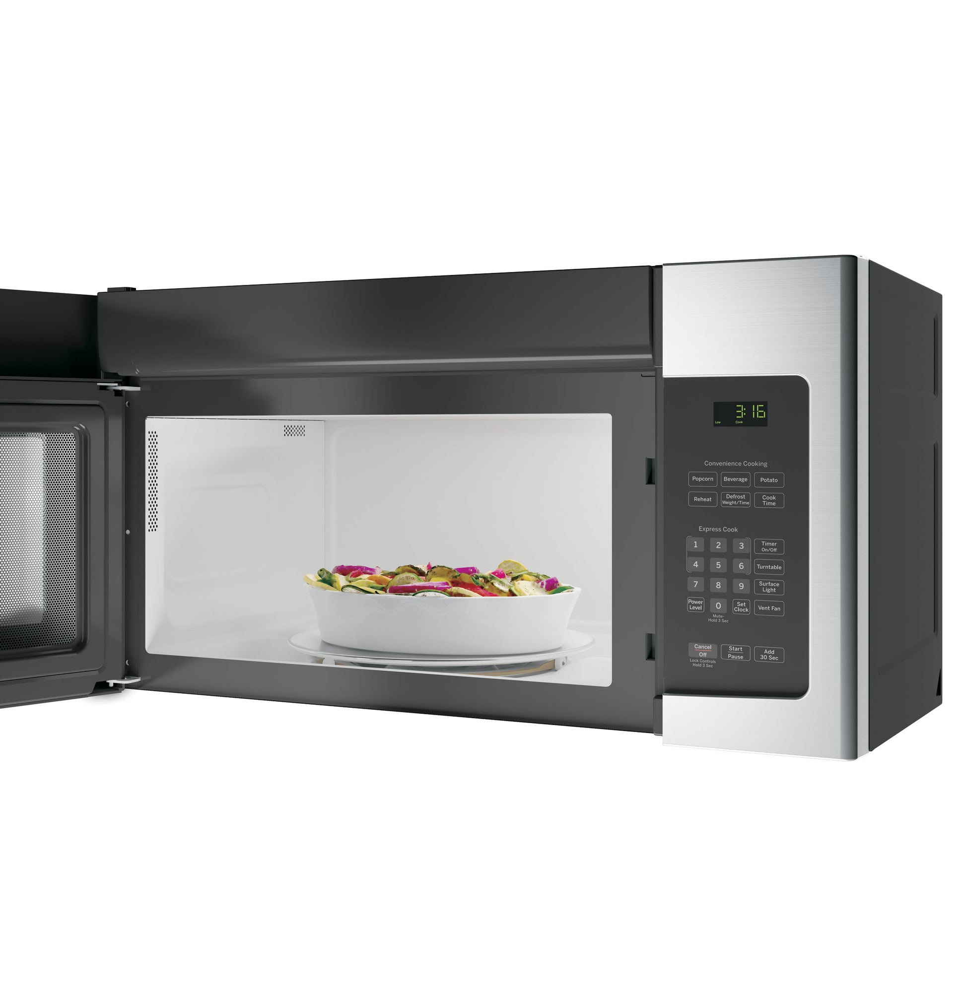 Opened over-the-range microwave oven with stainless steel finish and bowl of food inside in kitchen setting