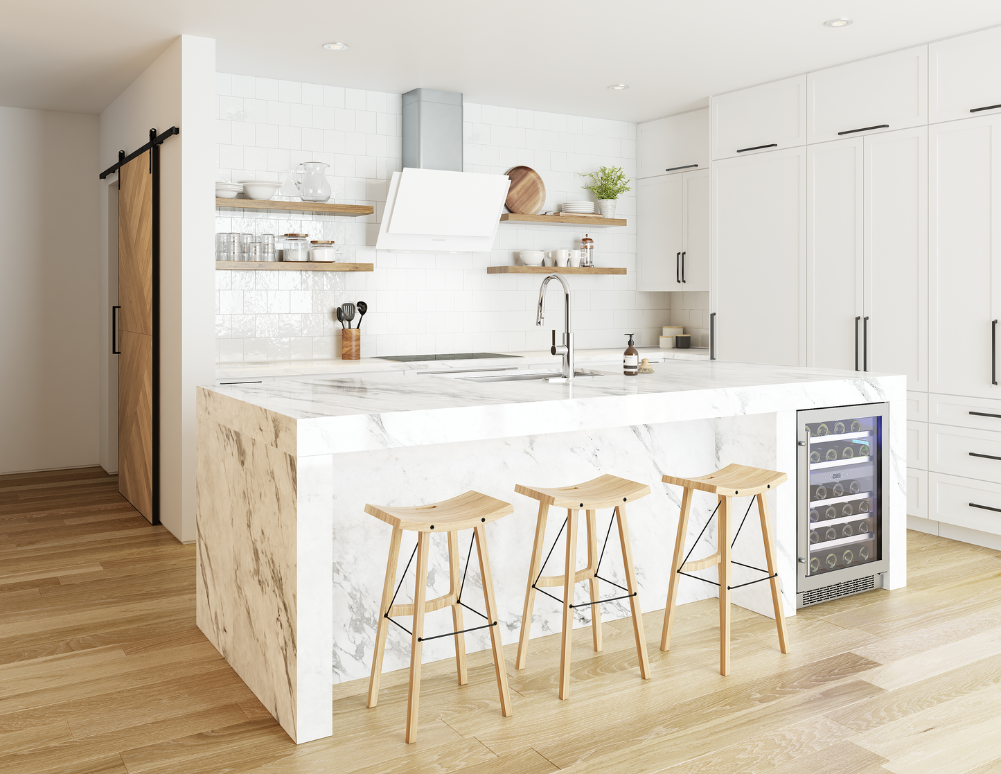 Modern kitchen with white angled wall hood above cooktop, marble island with wooden stools, and built-in wine cooler