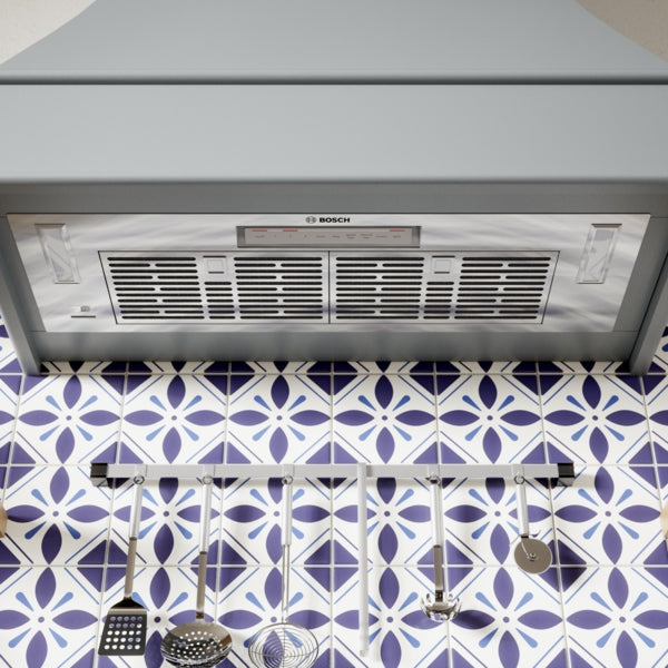 Stainless steel custom insert with mesh filters and control panel for over the range hoods from Bosch appliances collection
