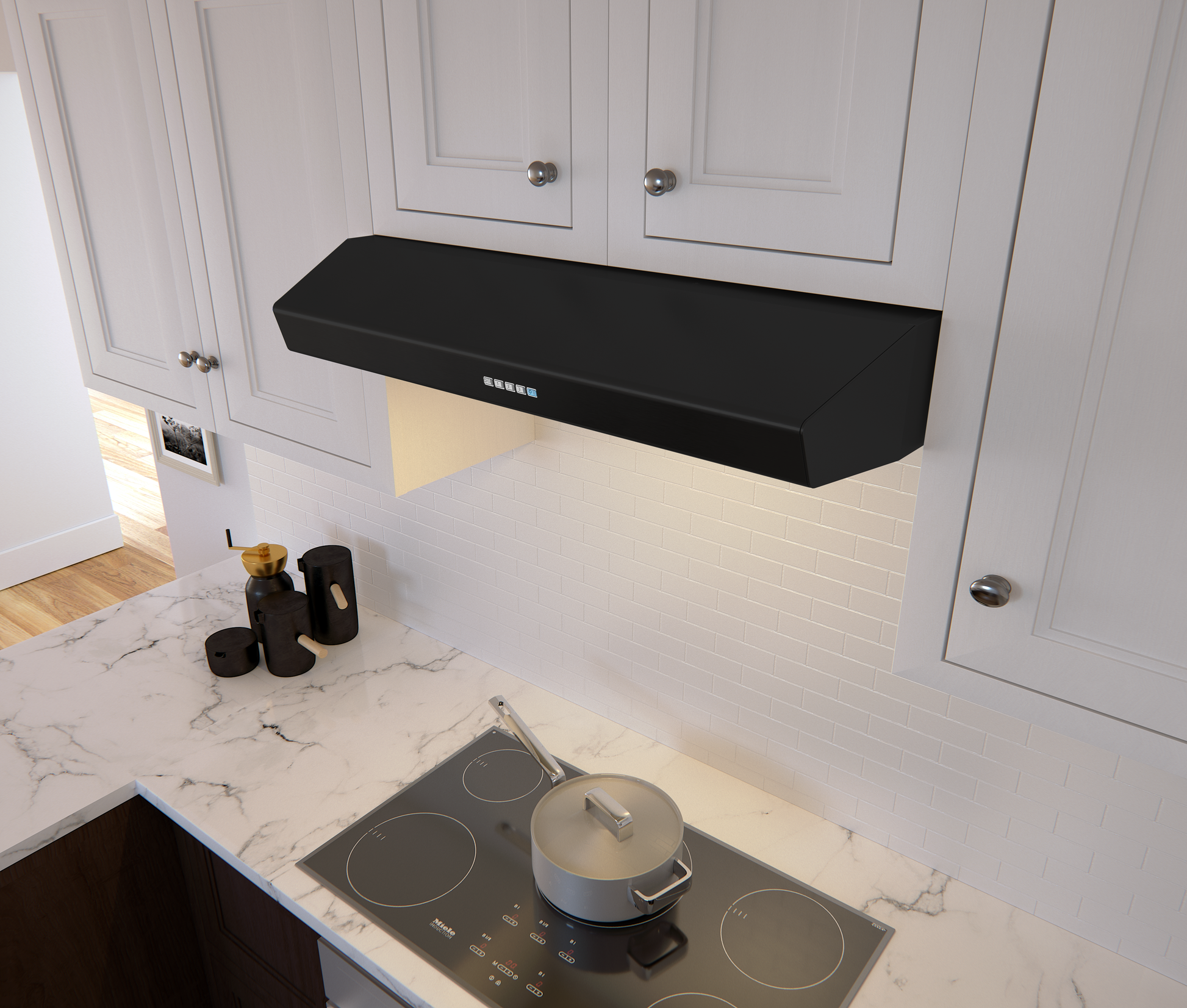 Matte black under cabinet range hood with LED lighting and electronic controls above electric cooktop in modern kitchen