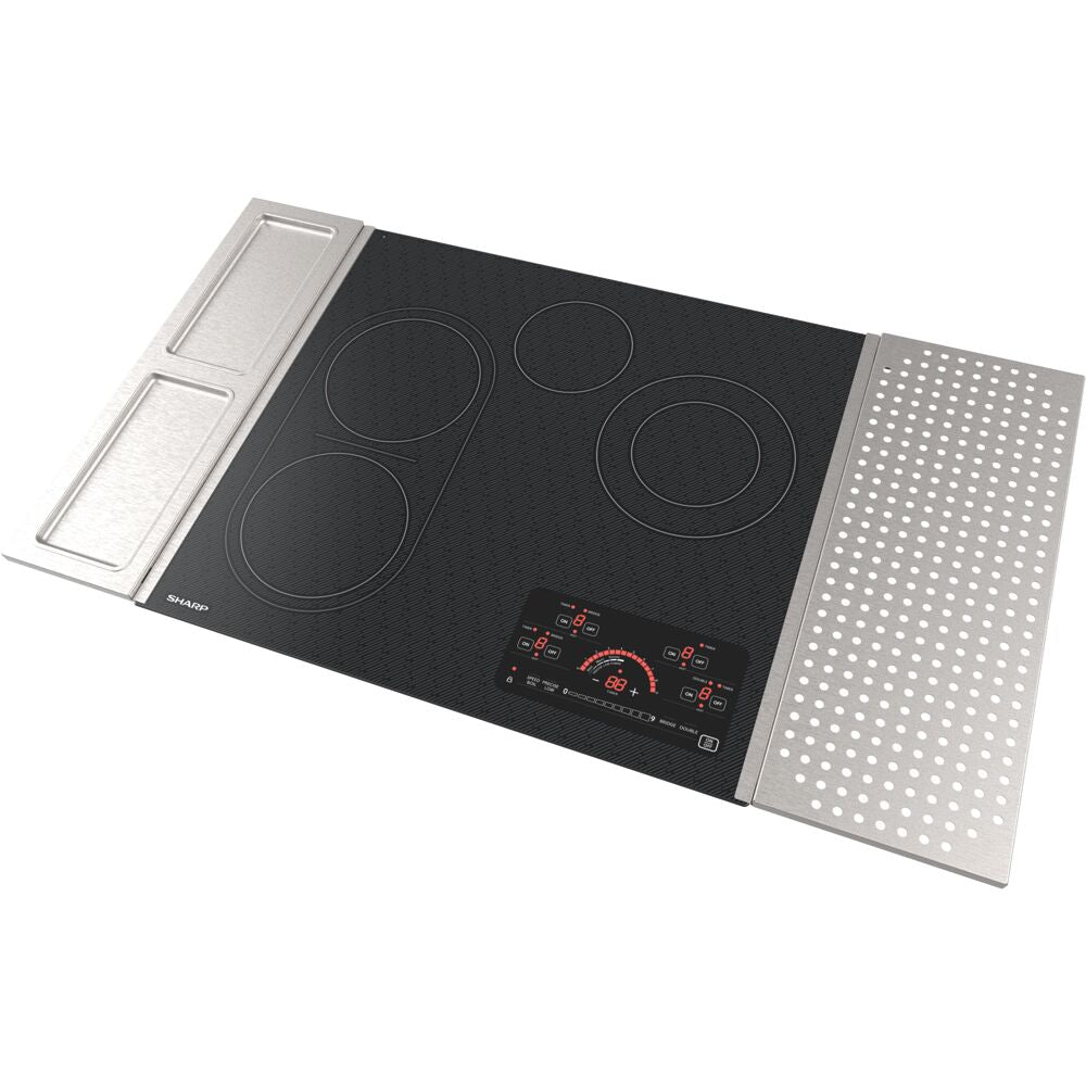 Black glass electric cooktop with four heating zones, digital touch controls, and stainless steel side trays for kitchenware collections